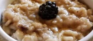 oatmeal with blackberry on top