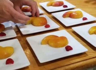 chef plating of peaches for breakfast